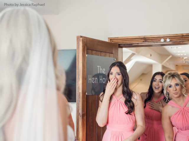 Emotional bridesmaids Bride reveals the wedding dress to her emotional bridesmaids