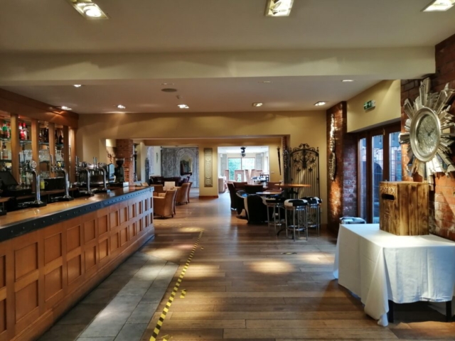Entrance and bar area of the Stables building at Nuthurst Grange