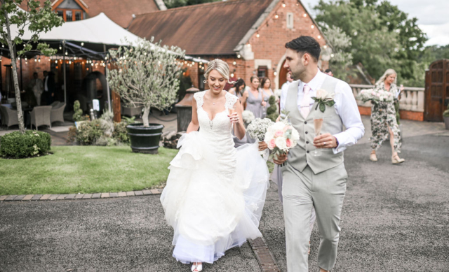 Wedding couple outside of the Stables
