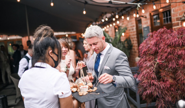 People enjoying canapes at Nuthurst Grange